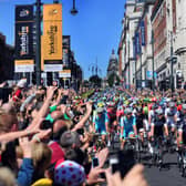 Mark Cavendish leads the cyclists down the Headrow at the Start of the Tour De France 6th July 2014.