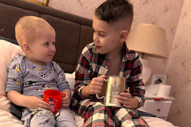 Charlie with his older brother Oliver