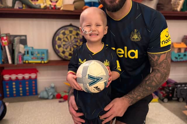 Charlie with his dad Lee, after the toddler was diagnosed with stage four metastatic embryonal rhabdomyosarcoma.