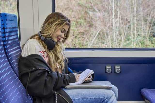 Travellers feel the train is the ideal place to enjoy and focus on their hobby
