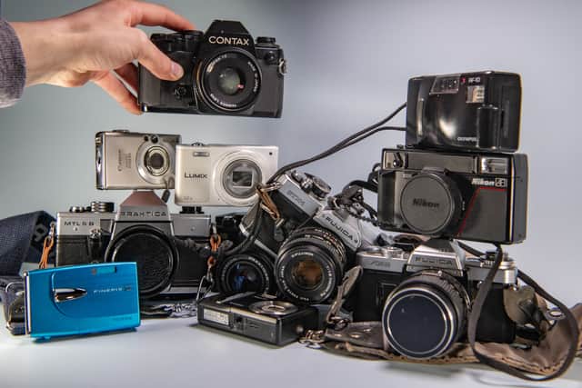 The couple sell digital cameras and SLR film cameras, camcorders, and accessories.