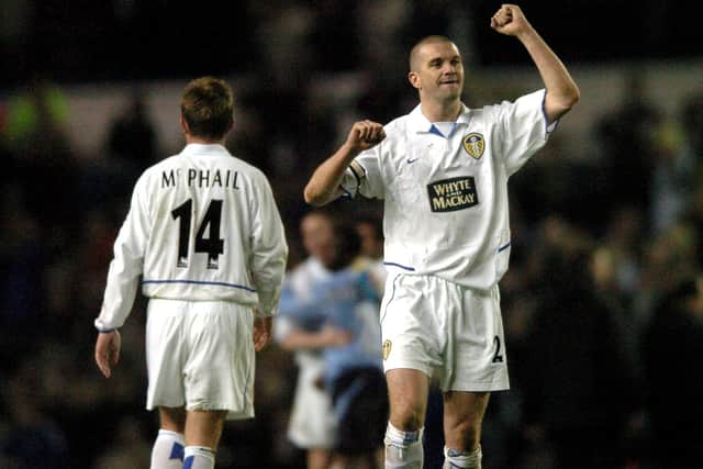 Leeds United captain Dominic Matteo celebrates with the fans after the 2-1 win over Manchester City.