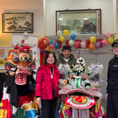Sally Pegg, David Cheung, and Terry Lo alongside LCCA volunteers Michael Pegg and Wa in costume