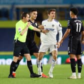 LONG HISTORY: Peter Bankes of Leeds United games in charge, the referee pictured separating Diego Llorente and Ollie Watkins in the Premier League clash at home to Aston Villa of February 2021.