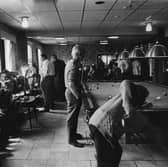 The games room at Seacroft Working Men's Club, Leeds, at lunchtime on a Sunday in June 1970