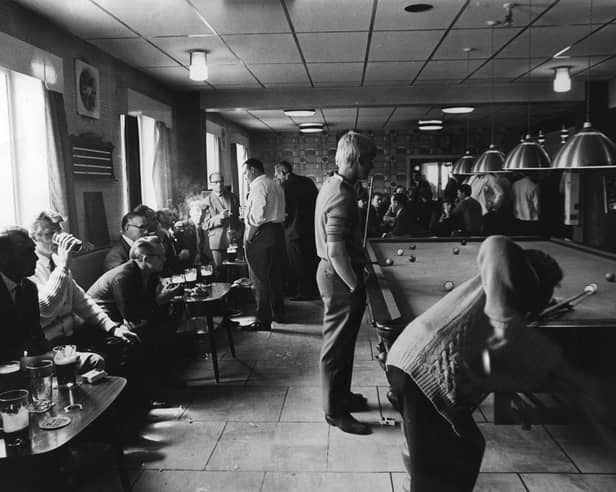 The games room at Seacroft Working Men's Club, Leeds, at lunchtime on a Sunday in June 1970