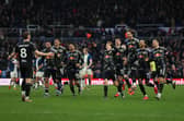The Leeds United players celebrate victory over Birmingham.