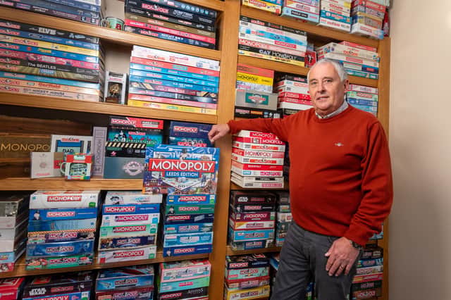Jason Bunn, World Monopoly Champion, with his Monopoly collection