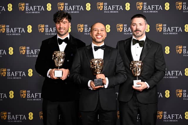 (L-R) Ben Jackson, Dean Atta and Baz Sells with the British Short Animation Award for Two Black Boys in Paradise.