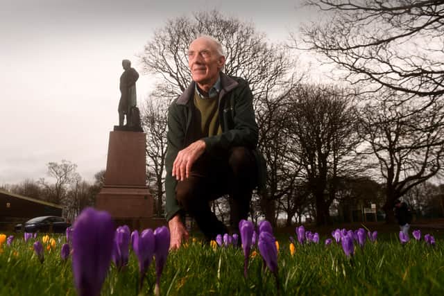 The guardian of the 'Lungs of the City.' Retired head gardener John Egan MBE looks over the floral welcome he helped create for the people of Leeds nearly five decades ago.