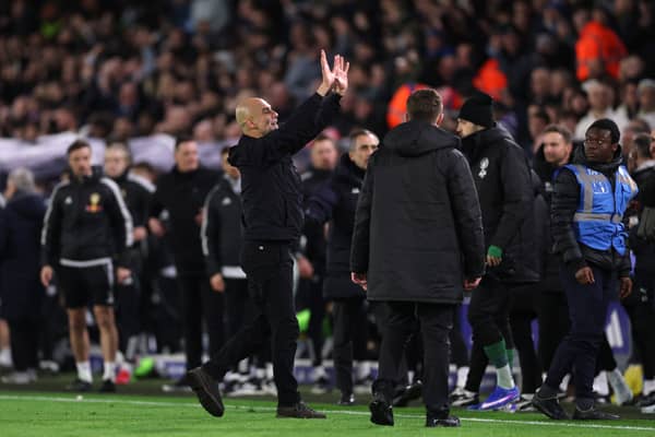 SARCASTIC: Wave to the Leeds United fans from Manchester City boss Pep Guardiola after his side's 1-0 win at Elland Road.