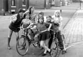 This group of girls and boys, with their bicycles, are posing for the camera with attitude. They are believed to have just returned from Kirkstall swimming baths on Kirkstall Road, which was close by. The location is believed to be Wolseley Road between Amy Street, far left, and Minnie Street before the junction with St. Matthias Place.