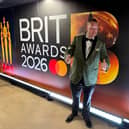 Danny Malin traded his usual table and chair setup outside of a food establishment for the red carpet of the BRIT Awards this past weekend.