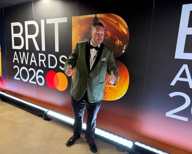 Danny Malin traded his usual table and chair setup outside of a food establishment for the red carpet of the BRIT Awards this past weekend.