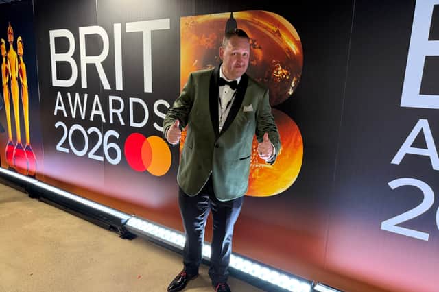 Danny Malin traded his usual table and chair setup outside of a food establishment for the red carpet of the BRIT Awards this past weekend.
