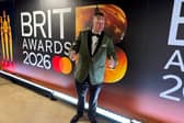 Danny Malin traded his usual table and chair setup outside of a food establishment for the red carpet of the BRIT Awards this past weekend.