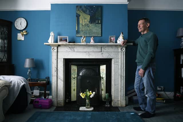 The fireplace is one of the features that has been kept from Barbara's time growing up in the home.