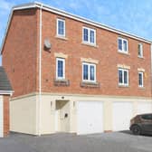 This modern townhouse in New Forest Village offers smart kerb appeal with driveway parking, EV charging and an integral garage