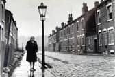 Ethel Kay, the street's last resident, stands on Cardigan Grove, Burley, Leeds, before it was demolished in 1970