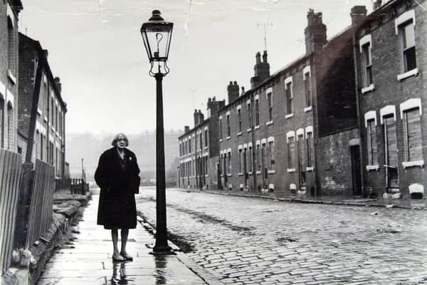Ethel Kay, the street's last resident, stands on Cardigan Grove, Burley, Leeds, before it was demolished in 1970