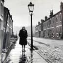 Ethel Kay, the street's last resident, stands on Cardigan Grove, Burley, Leeds, before it was demolished in 1970
