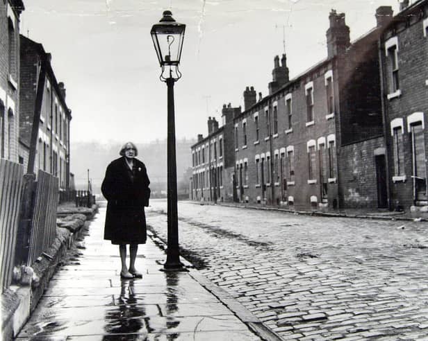 Ethel Kay, the street's last resident, stands on Cardigan Grove, Burley, Leeds, before it was demolished in 1970