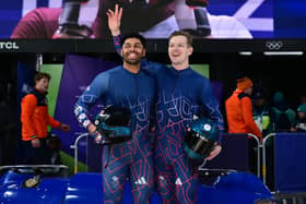 AIM TO INSPIRE: For Leeds and Team GB bobsleigh star Leon Greenwood, left, pictured with Brad Hall after competing in the bobsleigh men's 2-man heat 4 at Cortina Sliding Centre during the Milano Cortina 2026 Winter Olympic Games in Cortina d'Ampezzo. Photo by Stefano RELLANDINI / AFP via Getty Images.