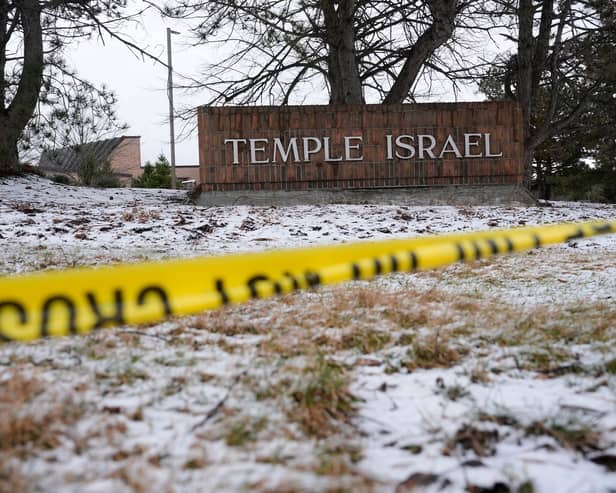 Police tape hangs outside the Temple Israel synagogue in West Bloomfield Township, Michigan, following the attack 