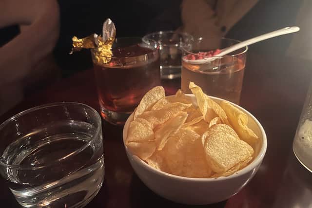 The Handbag Snacks, a playful twist on an Old Fashioned featuring butterscotch and finished with its own homemade butterscotch candy garnish, and Licking the Spoon, a rum-based cocktail inspired by the nostalgic flavours of a Victoria sponge cake