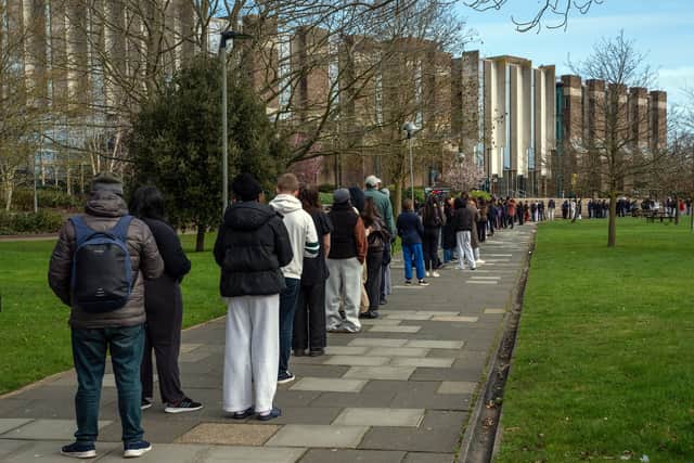 Students at the University of Kent queue for antibiotics after a meningitis outbreak.