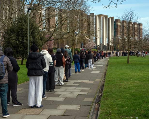 Students at the University of Kent queue for antibiotics after a meningitis outbreak.