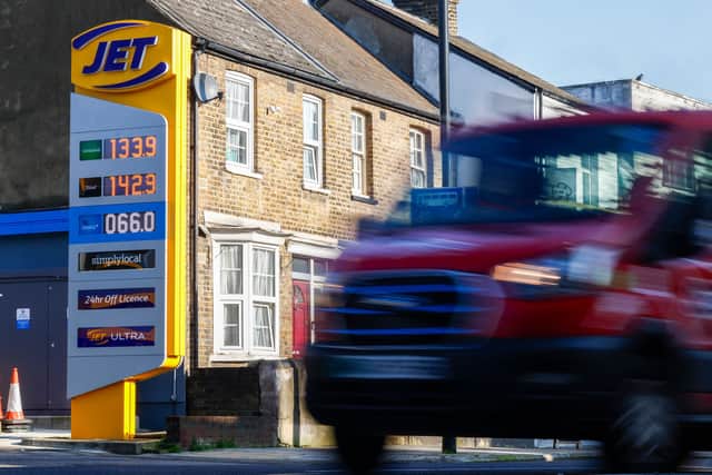 The price per litre of unleaded petrol and diesel fuels, along with the cost to chard an electric vehicle (EV), are picture outside a Jet petrol station. Rising costs are driven by global oil prices and supply risks through the Strait of Hormuz (Photo: Brook Mitchell / AFP via Getty Images)