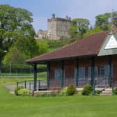 Explore the historic 'village on the hill' and its famous field of gold