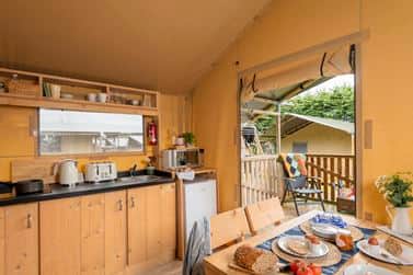 Safari tents have all the creature comforts you need for a week away - but an upgrade to a caravan would only be about £50 more