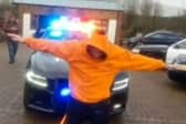  John Stephenson hauled a two-tonne car 20 metres (65ft) across a West Yorkshire storage yard after his head was set on fire.