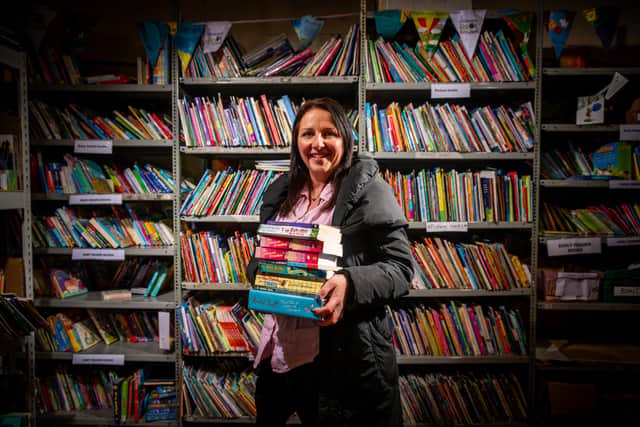 Selina Marsden, one of the team members from HSBC who were helping to pack books into boxes for schools.