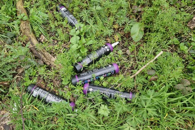 The empty used cannisters of nitrous oxide.