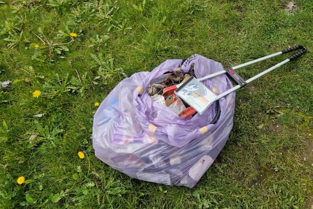 A discarded empty CD case for a Bob Marley album.