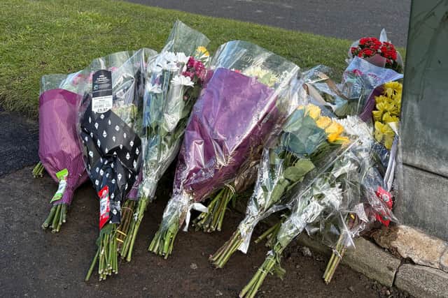 Tributes left at the scene in Kennerleigh Avenue
