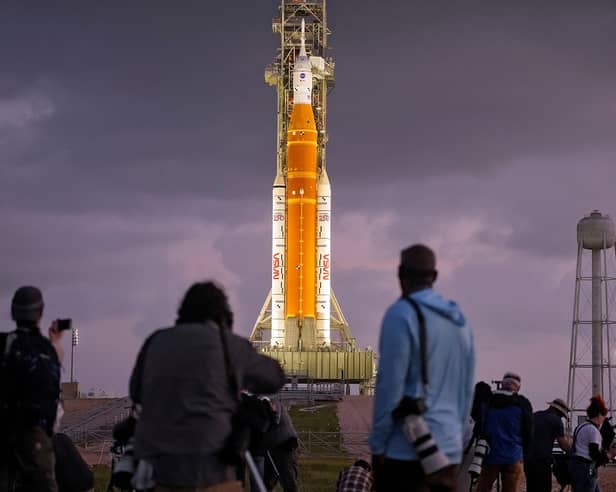  NASA's Artemis II moon rocket on Launch Pad 39-B just before sunrise at the Kennedy Space Center