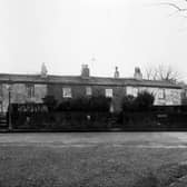 A row of cottages on Morris Lane named Hark To Rover pictured in December 1935.