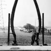 May 1967 and a workman is busy putting the finishing touches to a 20ft arch constructed from the jawbones of a 90 ton whale.