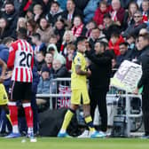 FRESH BLOWS: For key Leeds United rivals Tottenham as Cristian Romero is forced off injured.