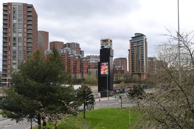The clock tower looms across the Leeds skyline.