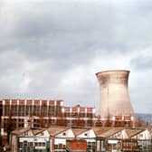 Kirkstall Power Station during the demolition of the cooling tower in April 1979. The sheds of the John Collier clothing factory can be seen in the foreground.