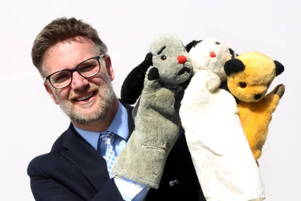 TV auctioneer Charles Hanson with three of the most famous glove puppets in the world.  They have been consigned for sale by his son Dave Corbett who, with his brother Matthew, was the inspiration behind the global phenomenon.
