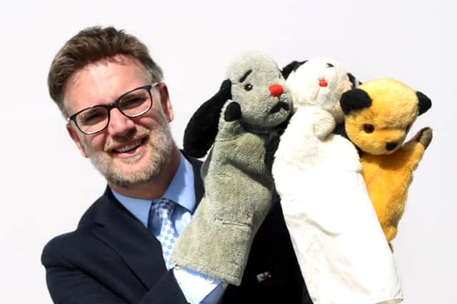 TV auctioneer Charles Hanson with three of the most famous glove puppets in the world. They have been consigned for sale by his son Dave Corbett who, with his brother Matthew, was the inspiration behind the global phenomenon.