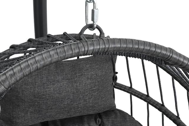The chair comes with a frame, but the chain can attach to any solid structure - or even a tree