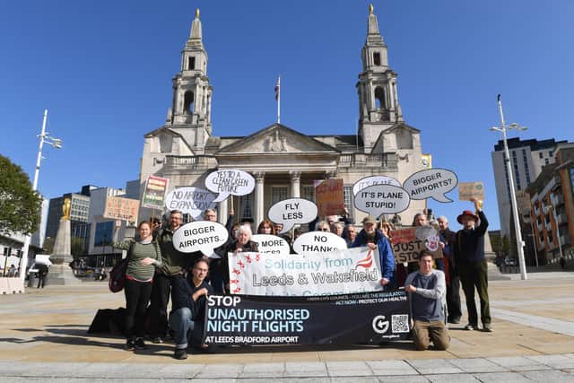 Local residents joined members of the Group for Action on Leeds Bradford Airport (GALBA) to protest in front of Leeds Civic Hall today.