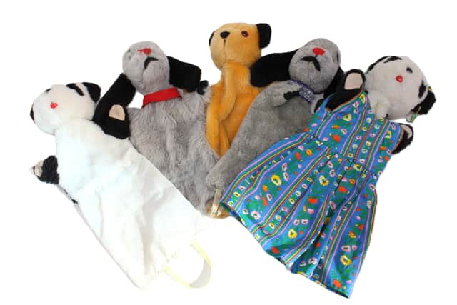 The famous Sooty puppets, which have links to Leeds, fetched thousands of pounds at auction.
